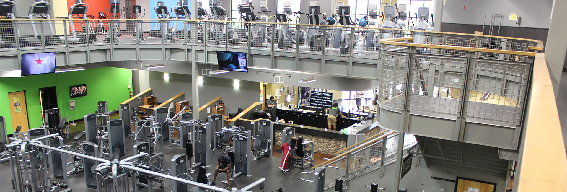 large and spacious two story gym with modern equipment